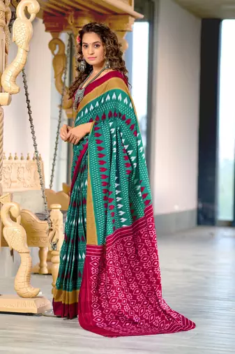 Teal blue ikkat, block print mulmul cotton saree with blouse.