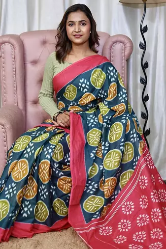 Teal blue ikkat print mulmul cotton saree with blouse.