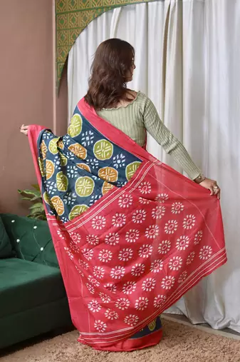 Teal blue ikkat print mulmul cotton saree with blouse.
