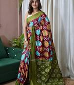 Wine ikkat print mulmul cotton saree with blouse.