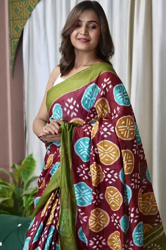 Wine ikkat print mulmul cotton saree with blouse.