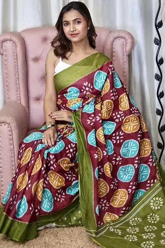 Wine ikkat print mulmul cotton saree with blouse.