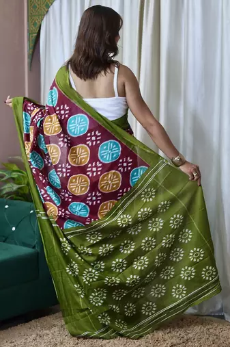 Wine ikkat print mulmul cotton saree with blouse.