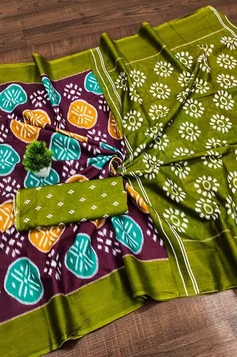 Wine ikkat print mulmul cotton saree with blouse.