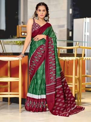 Dark green ikkat print mulmul cotton saree with blouse. 1