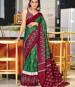 Dark green ikkat print mulmul cotton saree with blouse.