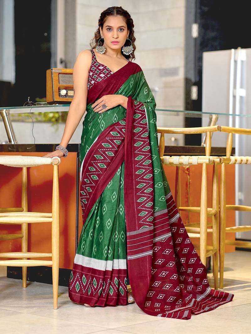 Dark green ikkat print mulmul cotton saree with blouse.