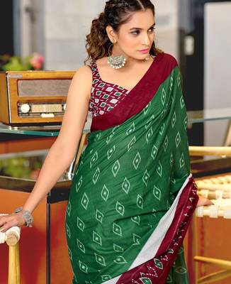 Dark green ikkat print mulmul cotton saree with blouse. 2