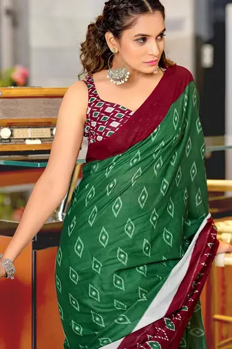 Dark green ikkat print mulmul cotton saree with blouse.