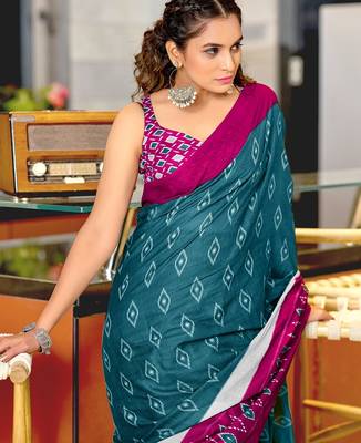 Teal blue ikkat print mulmul cotton saree with blouse. 2