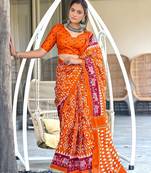 Orange ikkat print mulmul cotton saree with blouse.