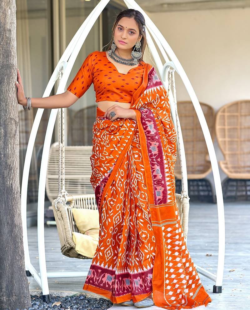 Orange ikkat print mulmul cotton saree with blouse.