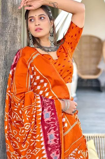 Orange ikkat print mulmul cotton saree with blouse.