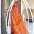 Orange ikkat print mulmul cotton saree with blouse.