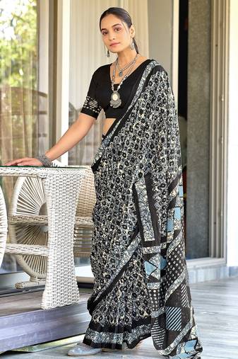 Black batik print mulmul cotton saree with blouse.