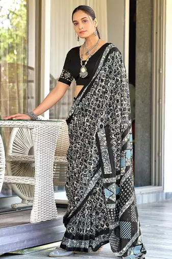 Black batik print mulmul cotton saree with blouse.