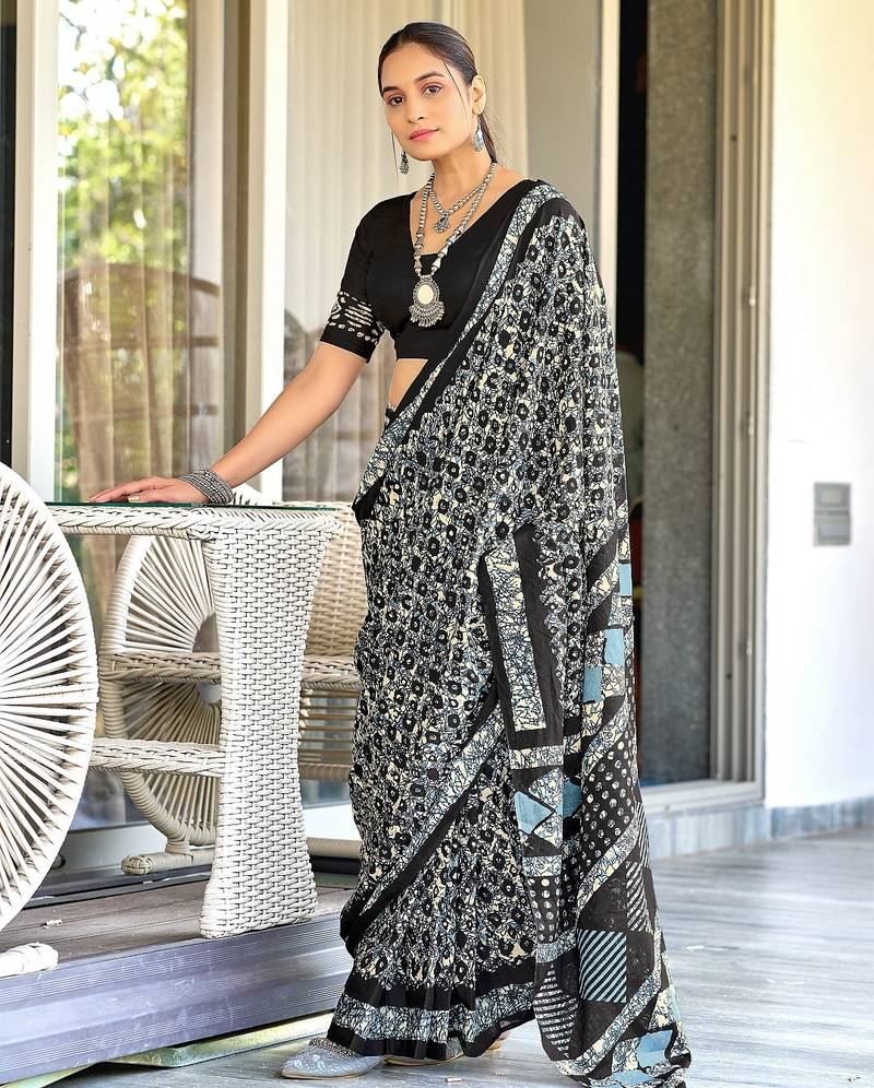 Black batik print mulmul cotton saree with blouse.
