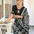 Black batik print mulmul cotton saree with blouse.
