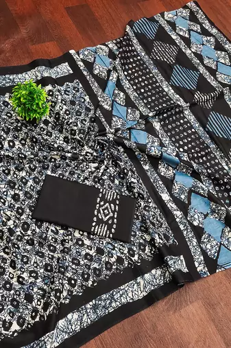 Black batik print mulmul cotton saree with blouse.