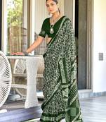 Green batik print mulmul cotton saree with blouse.