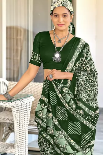 Green batik print mulmul cotton saree with blouse.