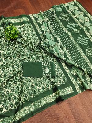 Green batik print mulmul cotton saree with blouse. 5