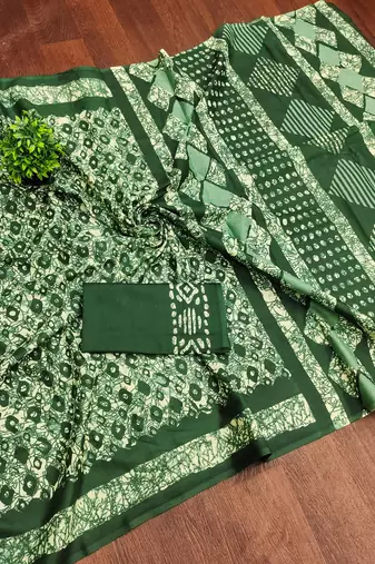 Green batik print mulmul cotton saree with blouse.