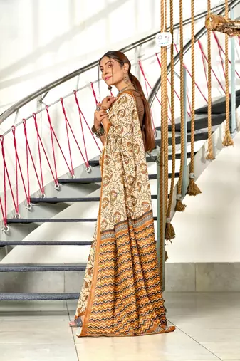 Brown floral, zigzag print mulmul cotton saree with blouse.