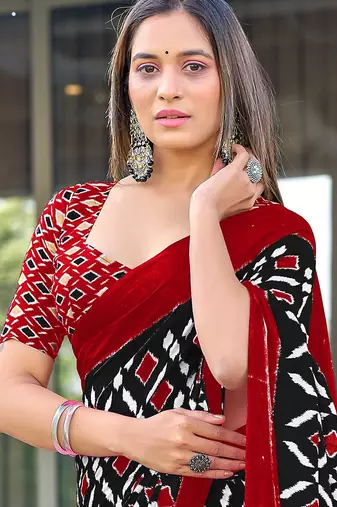 Black ikkat print mulmul cotton saree with blouse.