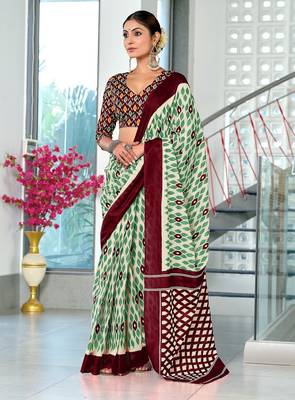 Wine ikkat print mulmul cotton saree with blouse. 1