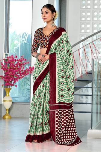 Wine ikkat print mulmul cotton saree with blouse.