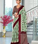 Wine ikkat print mulmul cotton saree with blouse.