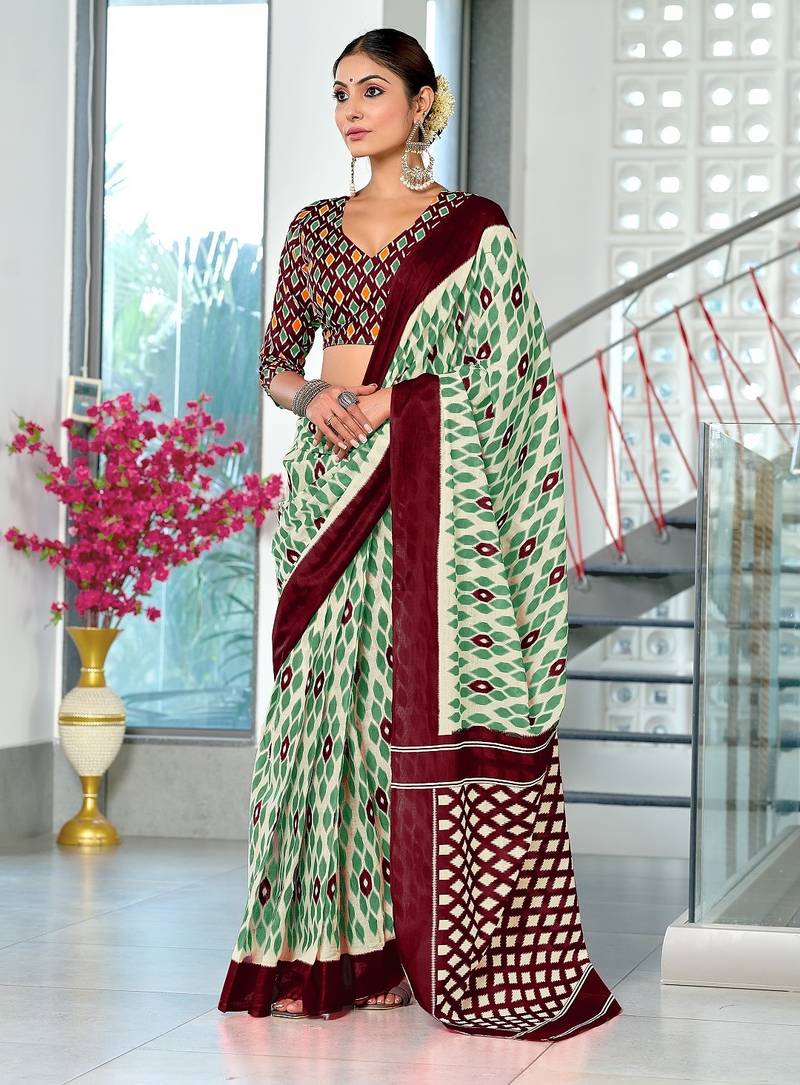 Wine ikkat print mulmul cotton saree with blouse.