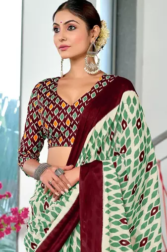 Wine ikkat print mulmul cotton saree with blouse.