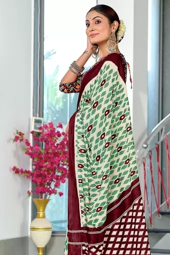 Wine ikkat print mulmul cotton saree with blouse.