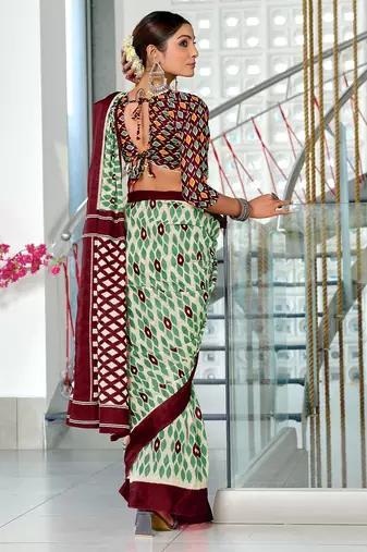 Wine ikkat print mulmul cotton saree with blouse.