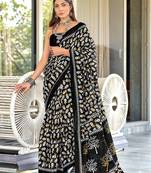 Black floral print mulmul cotton saree with blouse.