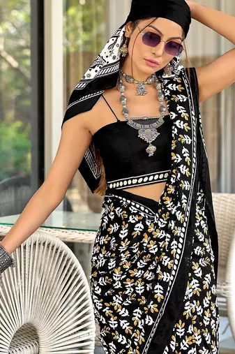 Black floral print mulmul cotton saree with blouse.