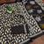 Black floral print mulmul cotton saree with blouse.