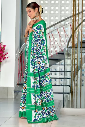 Green ikkat print mulmul cotton saree with blouse.
