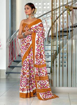 Mustard ikkat print mulmul cotton saree with blouse. 1