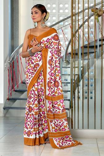 Mustard ikkat print mulmul cotton saree with blouse.