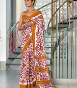 Mustard ikkat print mulmul cotton saree with blouse.