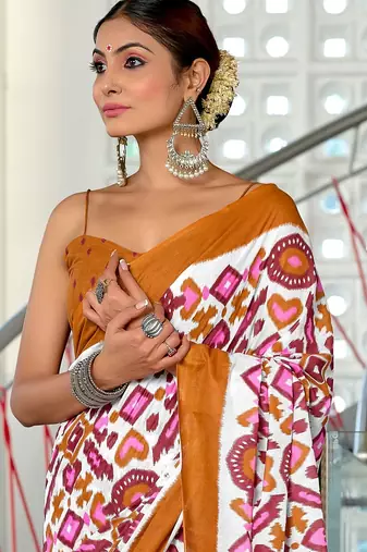 Mustard ikkat print mulmul cotton saree with blouse.