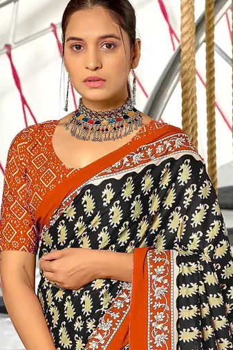 Black paisley print mulmul cotton saree with blouse.