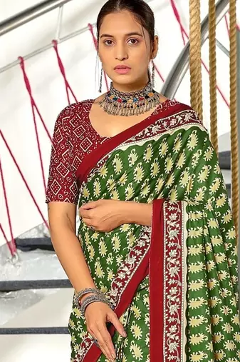 Green paisley print mulmul cotton saree with blouse.