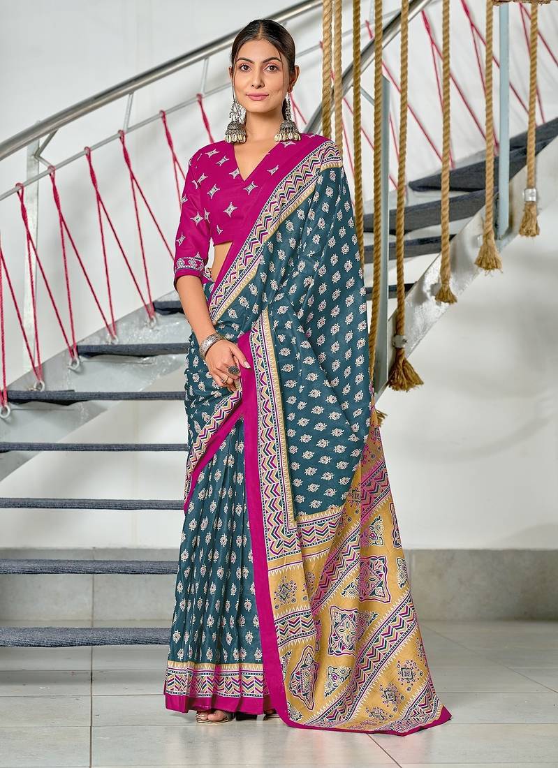 Teal blue floral print mulmul cotton saree with blouse.