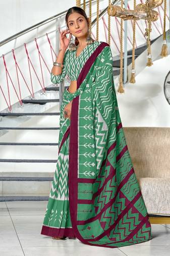 Green ikkat print mulmul cotton saree with blouse.