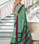 Green ikkat print mulmul cotton saree with blouse.