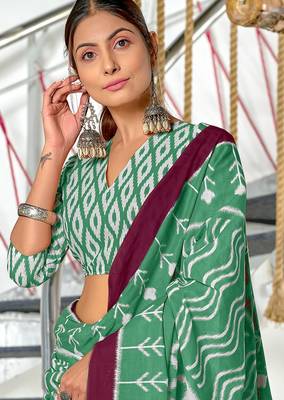 Green ikkat print mulmul cotton saree with blouse. 2